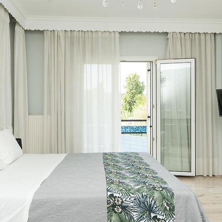 Glykanisos Suites Néa Péramos Extérieur photo