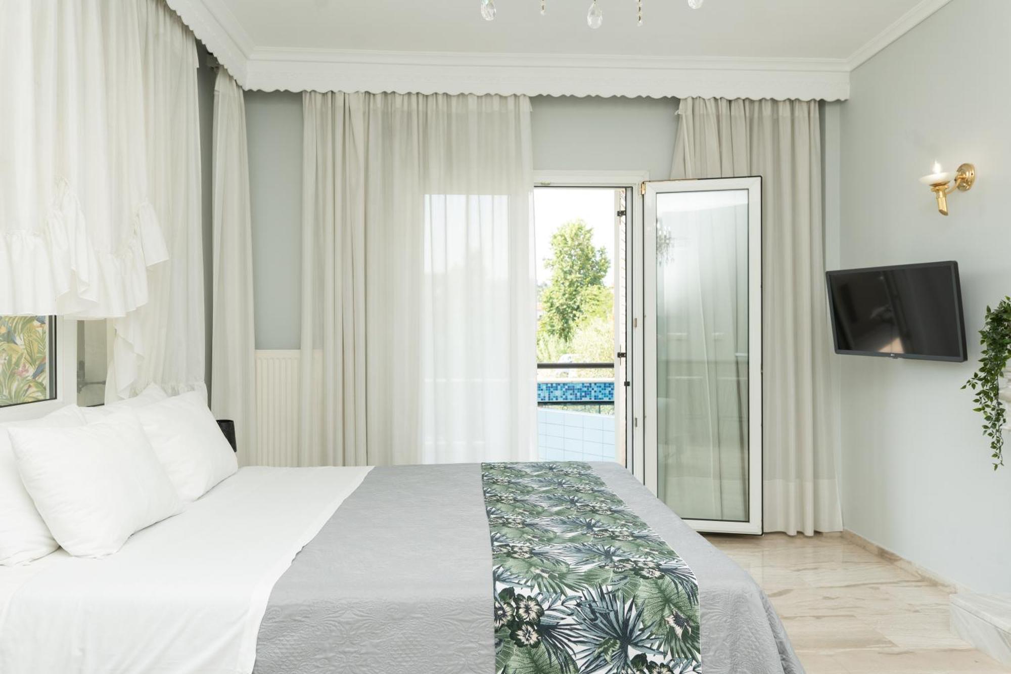 Glykanisos Suites Néa Péramos Extérieur photo